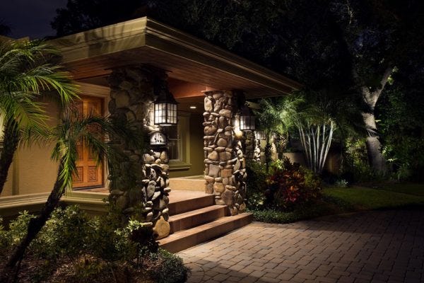 Illuminated home with AMP® Path Lights & Spotlights