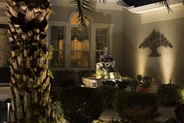 Illuminated home with AMP® Path Lights & Spotlights