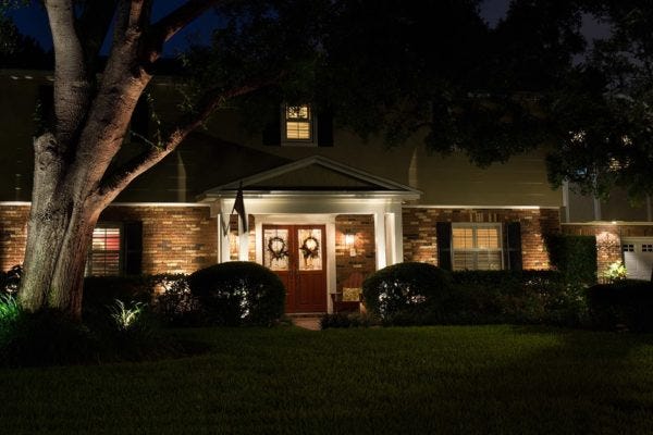 Illuminated home with AMP® Path Lights & Spotlights