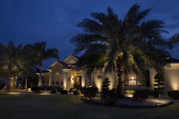 Illuminated home with AMP® Path Lights & Spotlights