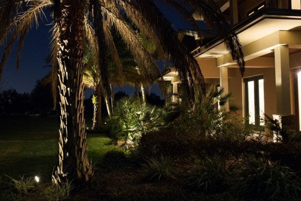 Illuminated home with AMP® Path Lights & Spotlights