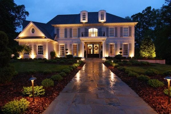 Illuminated home with AMP® Path Lights & Spotlights