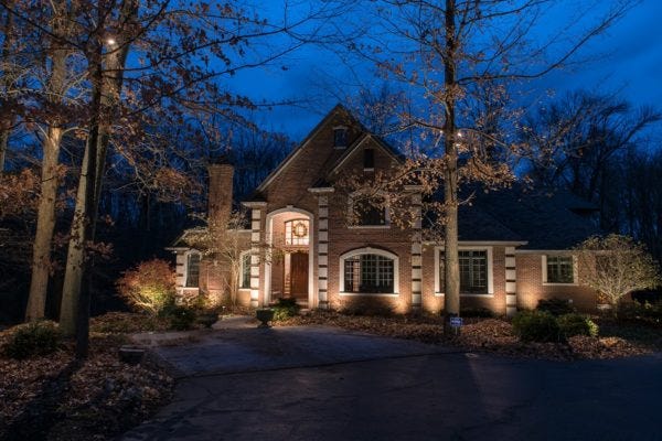 Illuminated home with AMP® Path Lights & Spotlights