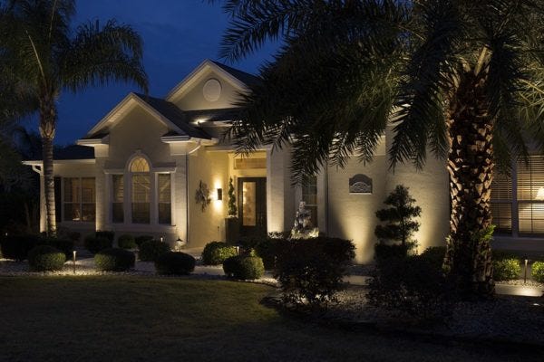 Illuminated home with AMP® Path Lights & Spotlights