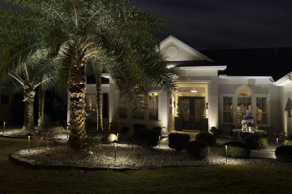 Illuminated home with AMP® Path Lights & Spotlights