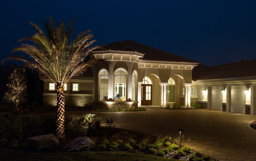 Illuminated Home using AMP® Path Lights & Spotlights