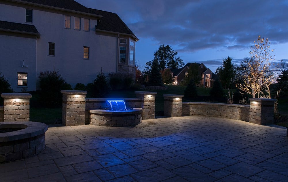 AMP® Lighting Hardscape lights installed on a patio